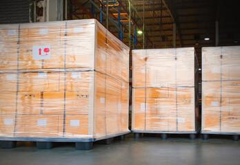 Package Boxes Wrapped Plastic Stacked on Pallets. Stockplie Storehouse,  Distribution, Supply Chain. Supplies Warehouse Shipping.	
