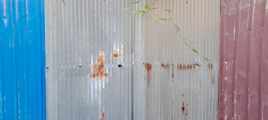 Old zinc vintage fence wall texture for background, pattern of rusty on metal panel.Tin Roof wall countryside