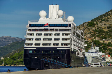Naklejka premium Luxury Azamara cruiseship cruise ship liner Journey, Quest, Pursuit or Onward in port of Dubrovnik, Croatia on sunny day during Adriatic Mediterranean cruising 