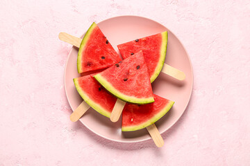 Plate with sweet watermelon sticks on pink background - obrazy, fototapety, plakaty