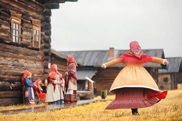 Traditional Slavic rituals in the rustic style. Outdoor in summer. Slavic village farm. Peasants in elegant robes. - obrazy, fototapety, plakaty