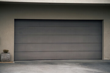 Garage door. Luxury and modern house with double garage door in Europe.