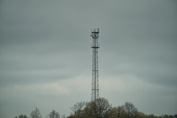 Cell Tower in Rural Landscape. Connecting Communities with 5G and 4G Networks. LTE internet tower for mobile phone