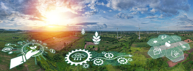 Panoramic view reveals a mesmerizing sight of windmills gracefully harnessing the power of wind, symbolizing the transformative potential of renewable energy in preserving planet.