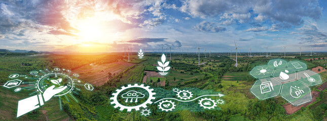 Fototapeta premium Panoramic view reveals a mesmerizing sight of windmills gracefully harnessing the power of wind, symbolizing the transformative potential of renewable energy in preserving planet.