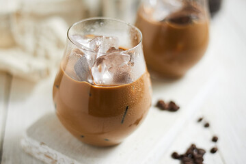 Refreshing iced latte coffee in a glass