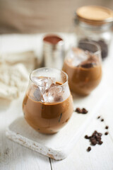 Refreshing iced latte coffee in a glass