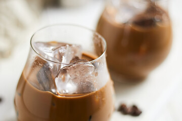 Refreshing iced latte coffee in a glass