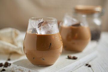 Refreshing iced latte coffee in a glass