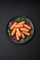 Delicious fresh boiled sausages with salt, spices and herbs