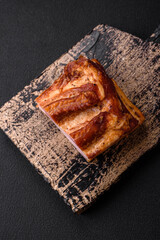 Delicious calorie smoked bacon with salt, spices and herbs