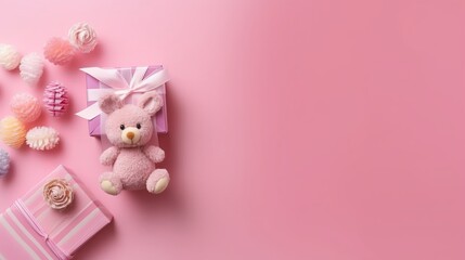 Obraz na płótnie Canvas Baby accessories concept. Top view photo of knitted bunny rattle toy giftbox tiny socks teddy-bear toy milk bottle and shiny confetti on isolated pastel pink background with copyspace generative ai
