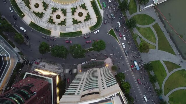 Top down drone perspective above tran hung dao statue by river, ho chi minh city