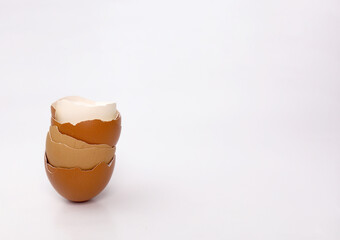 Broken or cracked egg shell isolated on white background.