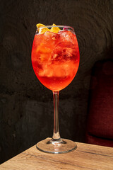 tasty cocktail on the wooden background