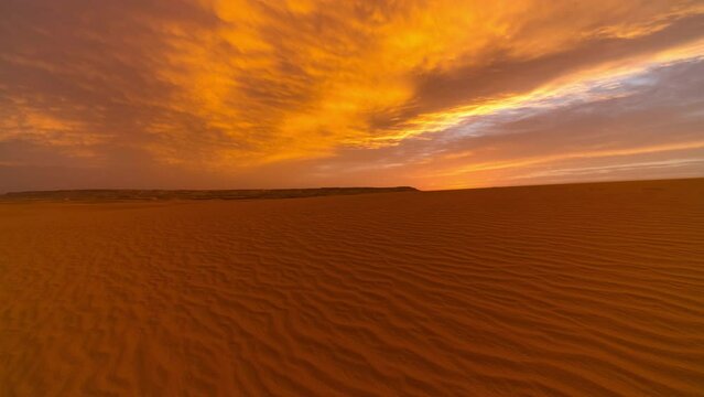 Timelapse of sunrise over the sand dunes in the desert. Sahara desert