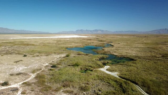 Drone shot of blue pool in cuatrocienegas