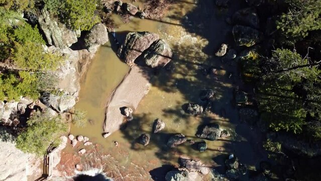 Cenital drone shot on the river of the Cusarare Waterfall, Chihuahua