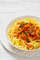 Creamy Paprika Pork Chunks over tagliatelle noodle