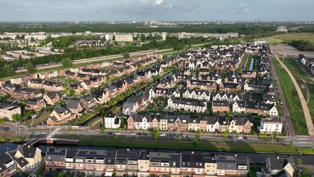 Residential development projects integrated in environment with canals. Drone