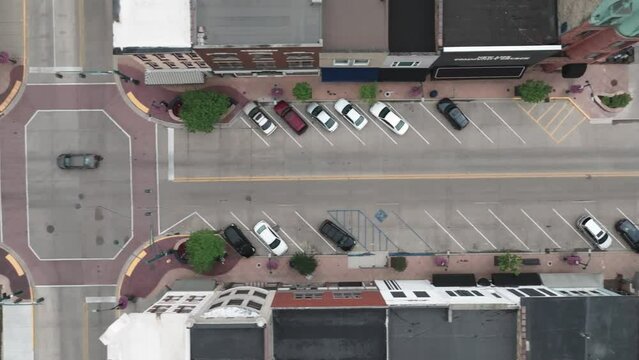 Downtown Elkhart, Indiana with drone video overhead looking down and moving left to right.