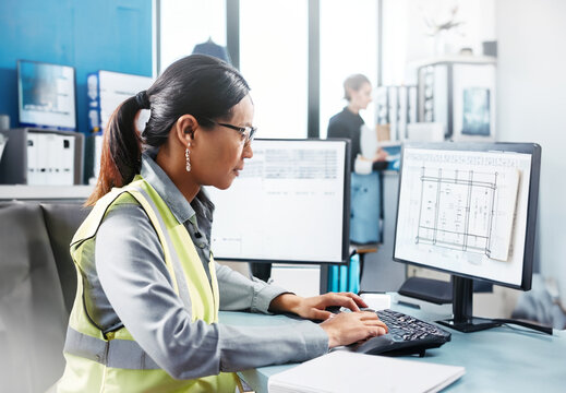  Engineer working on a computer in office. In Architectural Bureau: Architect and Engineer Working on a Prototype Project. Image created with Generative AI technology