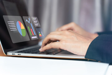 Businessman using computer for Document Management System (DMS) and online documentation database, paperless office concept