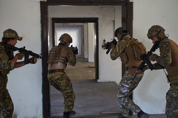 A group of professional soldiers bravely executes a dangerous rescue mission, surrounded by fire...