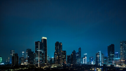 Fototapeta na wymiar Panoramic Jakarta skyline with urban skyscrapers at night
