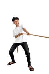 Indonesian men celebrate Indonesian independence day on 17 August with the tug of war contest