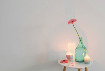 pink gerber oin glass vase on white background