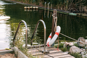 lifebuoy and descent into the lake