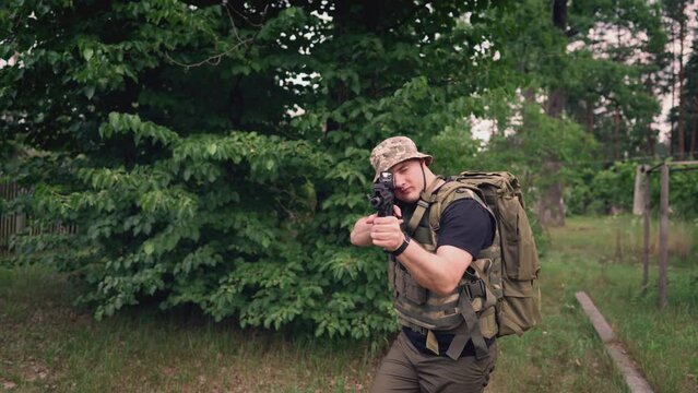 The soldier moves while looking through the scope