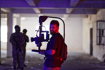 A professional cameraman captures the intense moments as a group of skilled soldiers embarks on a dangerous mission inside an abandoned building, their actions filled with suspense and bravery