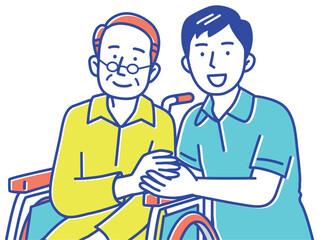 手を取り合う若い男性の介護士と車いすのシニア男性