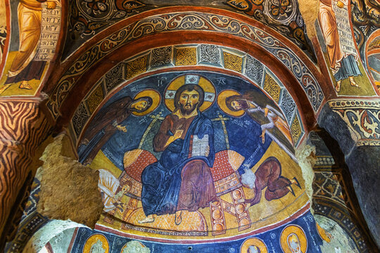 Fresco of Christ Pantocrator in the Dark Church (Karanlik Kilise) ruin in Goreme open air museum. June 16, 2022 - Cappadocia, Turkey