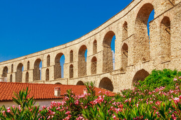 Obraz premium Old town, castle and aqueduct in Kavala, Greece, Europe in summer