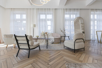 spacious open-plan apartment with stylish modern bright design, dressing area, bedroom, living room and bathroom on a sunny day