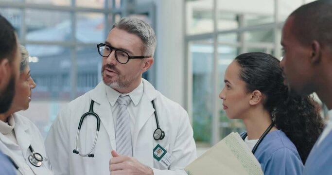Teamwork, nurses or doctors in a discussion for medical or healthcare feedback, review and results in hospital. Talking, teamwork or leader in conversation with nursing group after office meeting