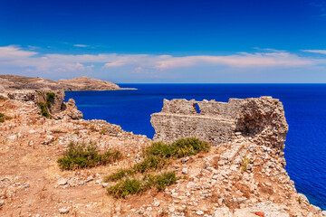 Fototapeta na wymiar Sea skyview landscape photo from Feraklos castle near Agia Agathi beach on Rhodes island, Dodecanese, Greece. Panorama with sand beach and clear blue water. Famous tourist destination in South Europe