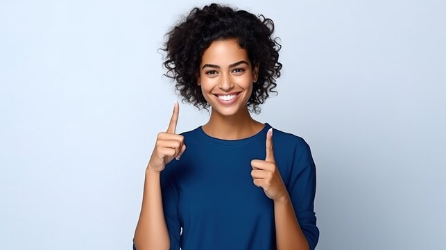 Young happy latin woman student showing ok hand okay sign winking isolated on blue background. Smiling female model advertising sale offer presenting promotion recommending discounts, generative ai