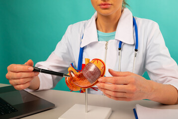 woman doctor pointing at stomach mockup