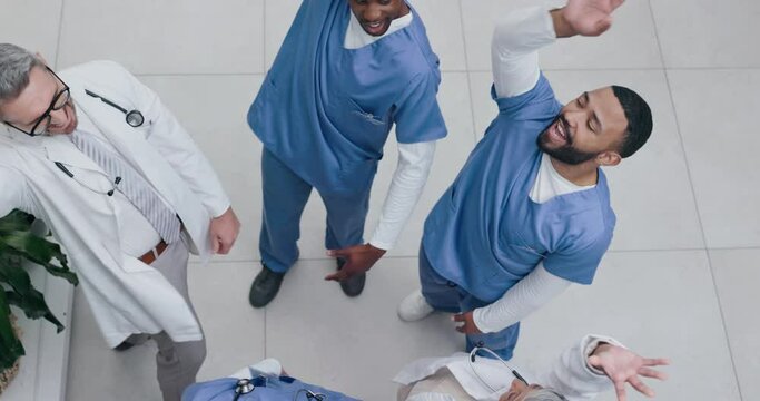 Top view, teamwork or hands of doctors or nurses in collaboration in meeting for healthcare target or goal. About us, team building or medical workers with group support, motivation or clinic mission