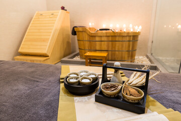 Natural treatments herbs treatment  aromatherapy and alight candles in spa salon.