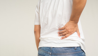 Waist pain prevention and management for better well-being. Posture, stretching, and exercise for...