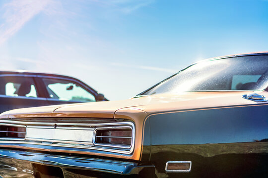 Vintage american car on blue sky background - retro filter effect