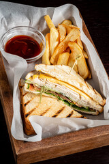 sandwich with baked potato and sauce