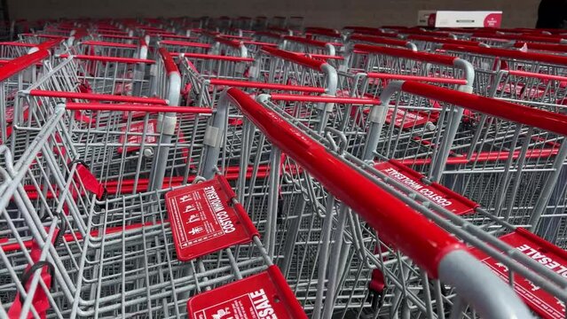 Costco Wholesale supermarket with groceries people go shopping big carts picking up goods shopping Canada Vancouver 