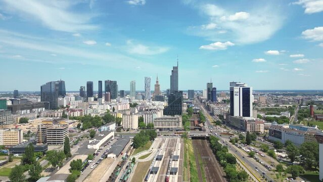 Aerial panorama of Warsaw, Poland over the Vistual river and City center in a distance. Downtown skyscrapers cityscape. Business