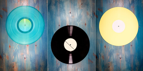 Collection of images with different color vinyl records on blue wood